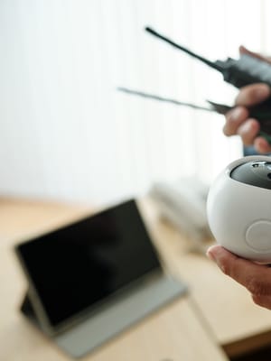 off grid security camera rv in the hands of a boondocker setting up his remote system